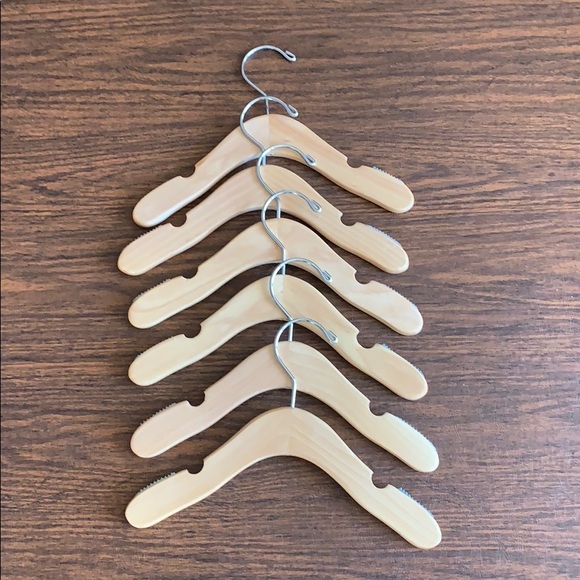 New Wooden Baby hangers set of (6)
